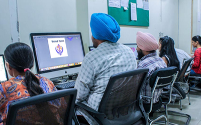 students with laptop